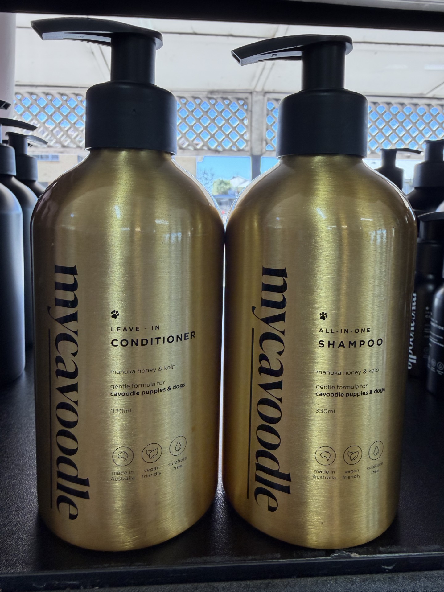 My Cavoodle gold bottles